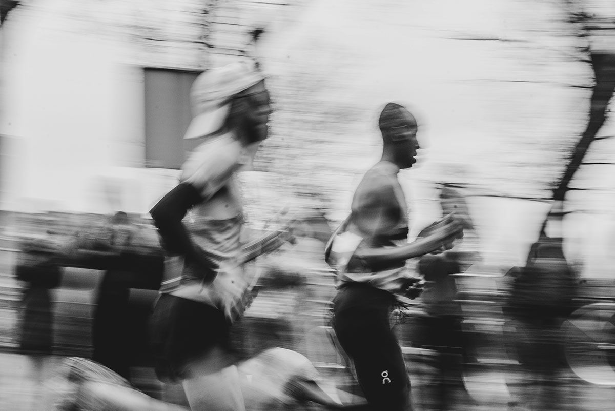 Track running session illustrating run performance training principles