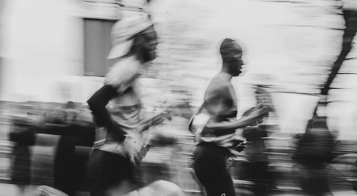 Track running session illustrating run performance training principles