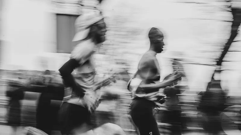 Track running session illustrating run performance training principles