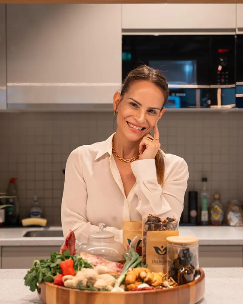 Claudia Ferreira with Chinese herbs and wholefoods at Body Perfected