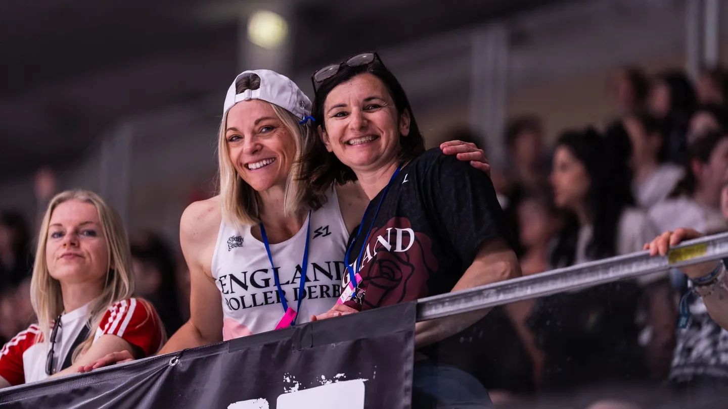 Carly Christensen courtside with England Women’s Roller Derby at the 2025 World Cup in Innsbruck
