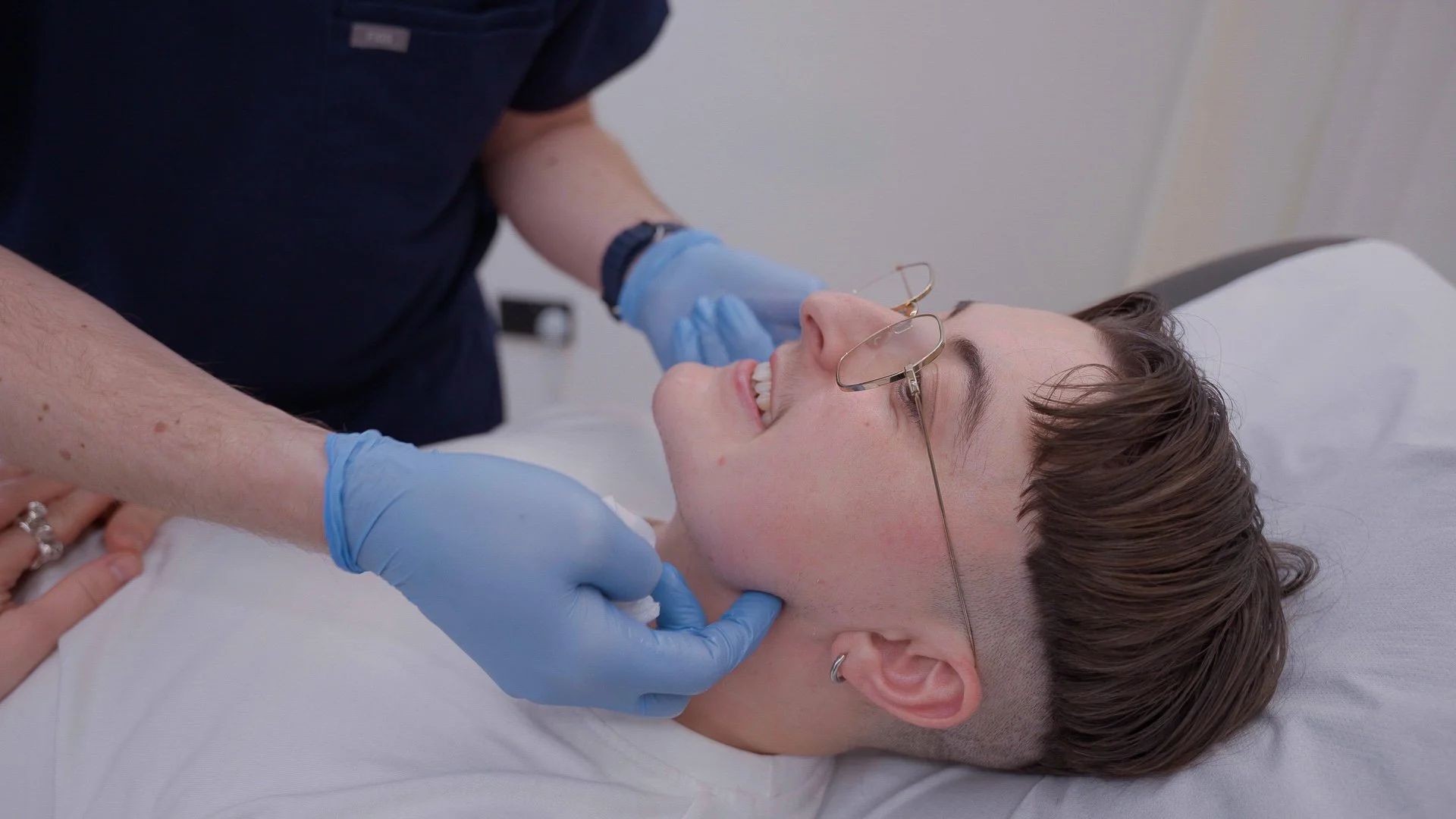 Editorial photography illustrating masculinising non-surgical rhinoplasty