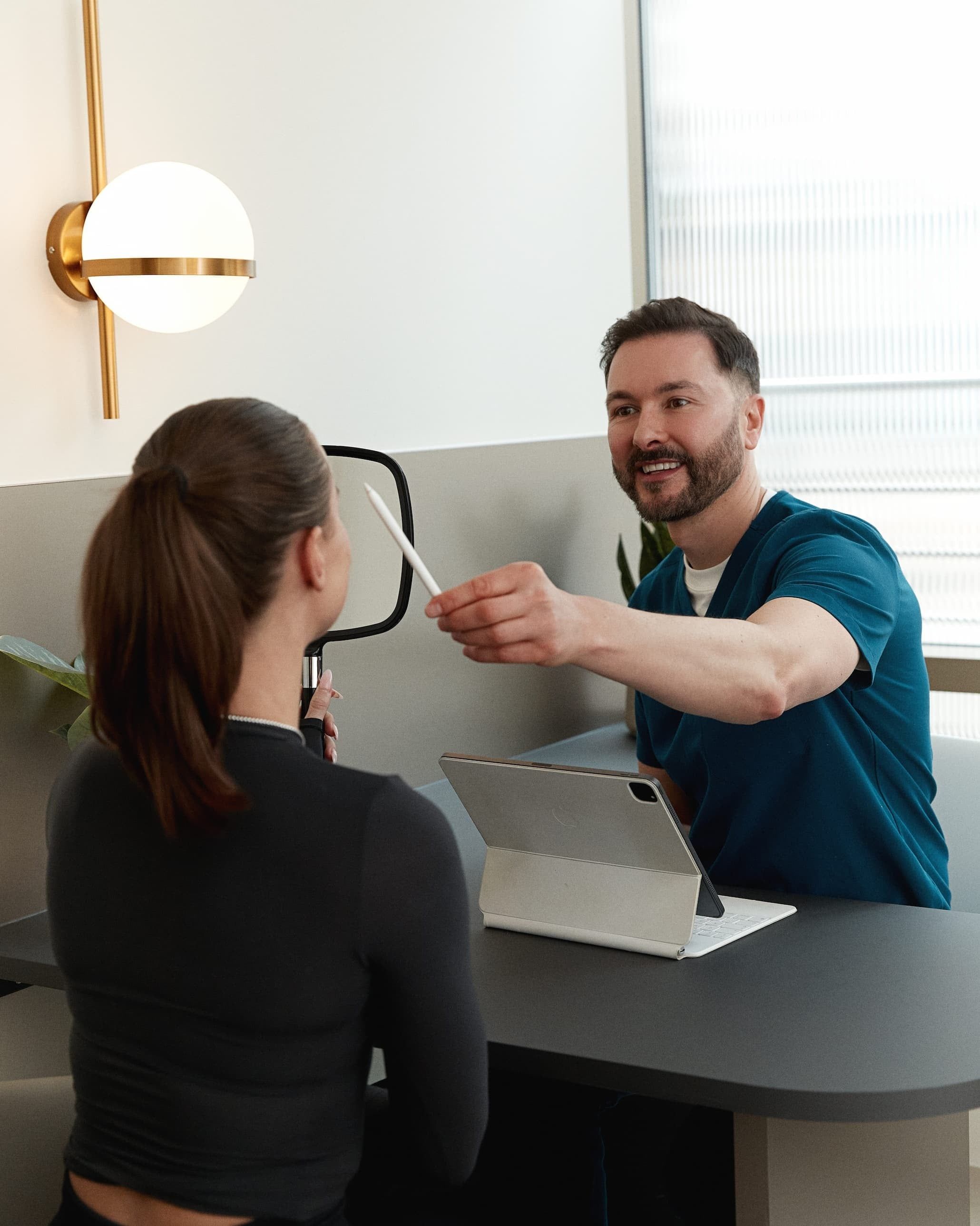 Dr Paul Elgey in consultation at his Marylebone clinic