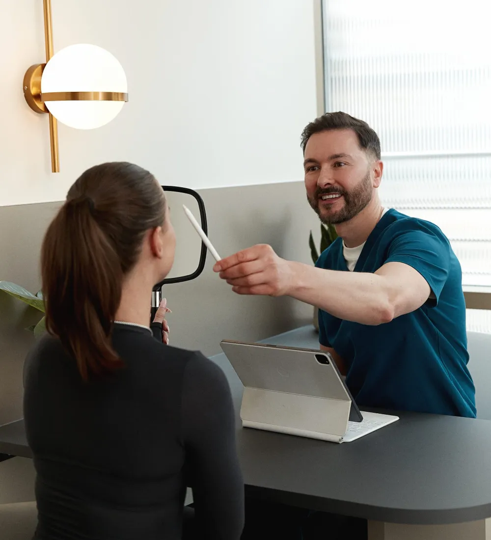 Dr Paul Elgey in consultation at his Marylebone clinic