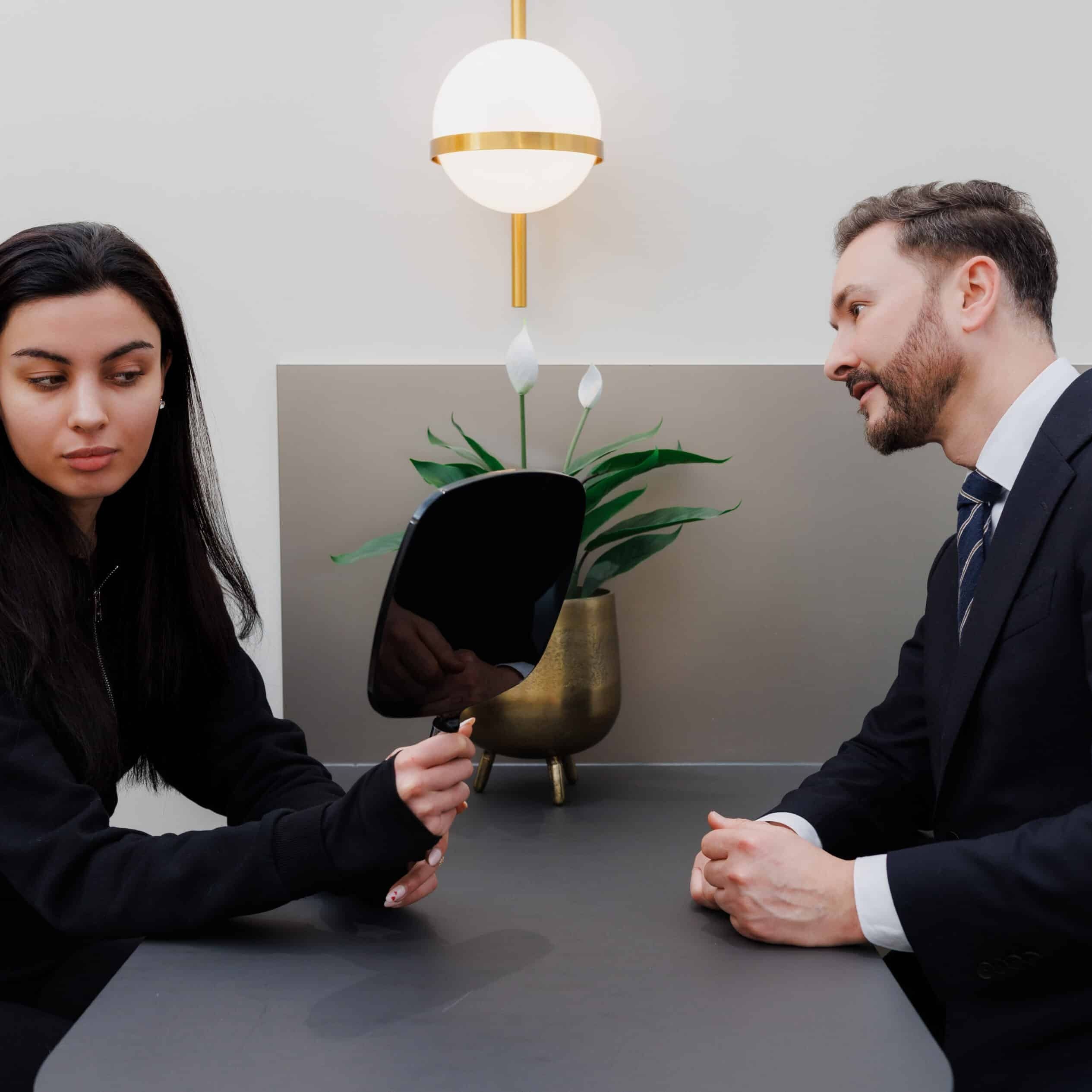 Dr Paul Elgey in consultation with a patient at his Marylebone clinic