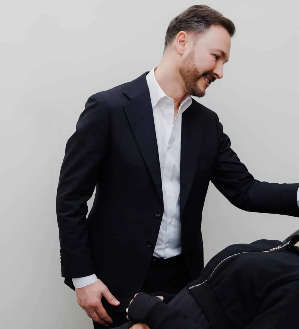 Dr Paul Elgey assessing a patient before treatment