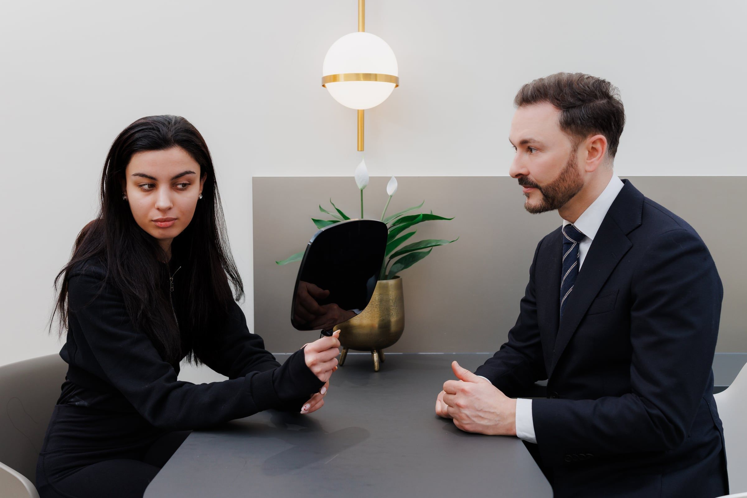 Dr Paul Elgey in consultation with a patient at his Marylebone clinic