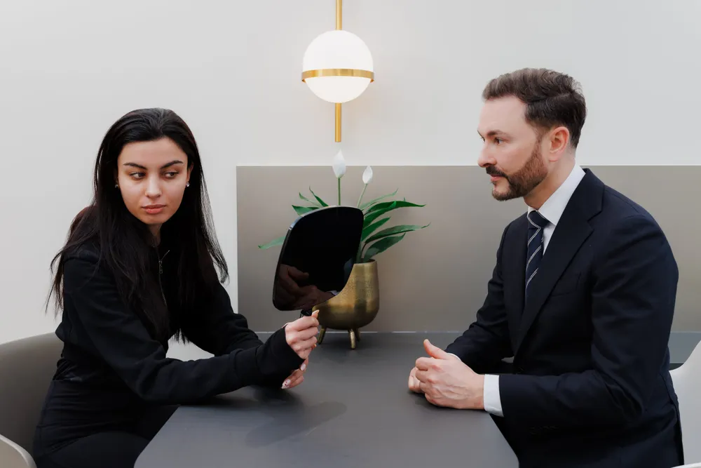 Dr Paul Elgey in consultation with a patient at his Marylebone clinic