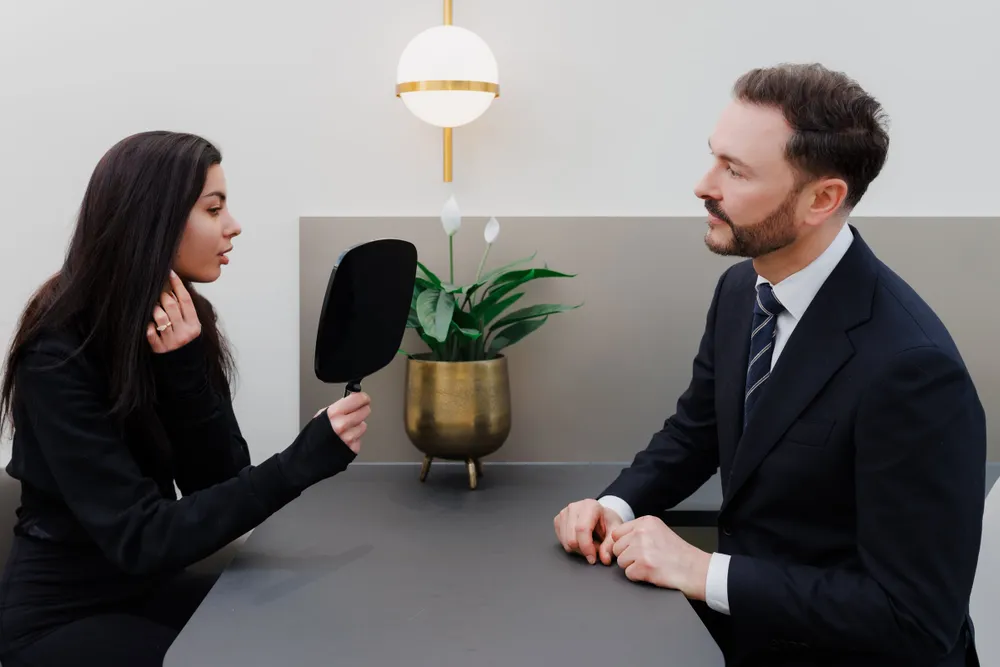 Dr Paul Elgey in consultation with a patient at his Marylebone clinic