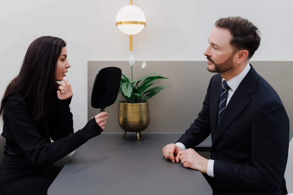 Dr Paul Elgey in consultation with a patient at his Marylebone clinic