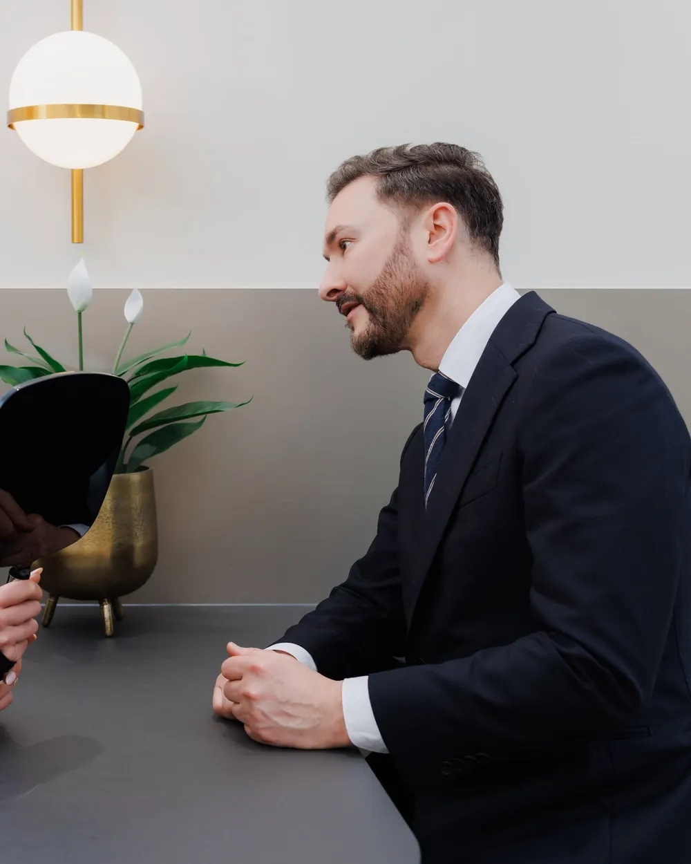 Dr Paul Elgey in consultation with a patient at his Marylebone clinic