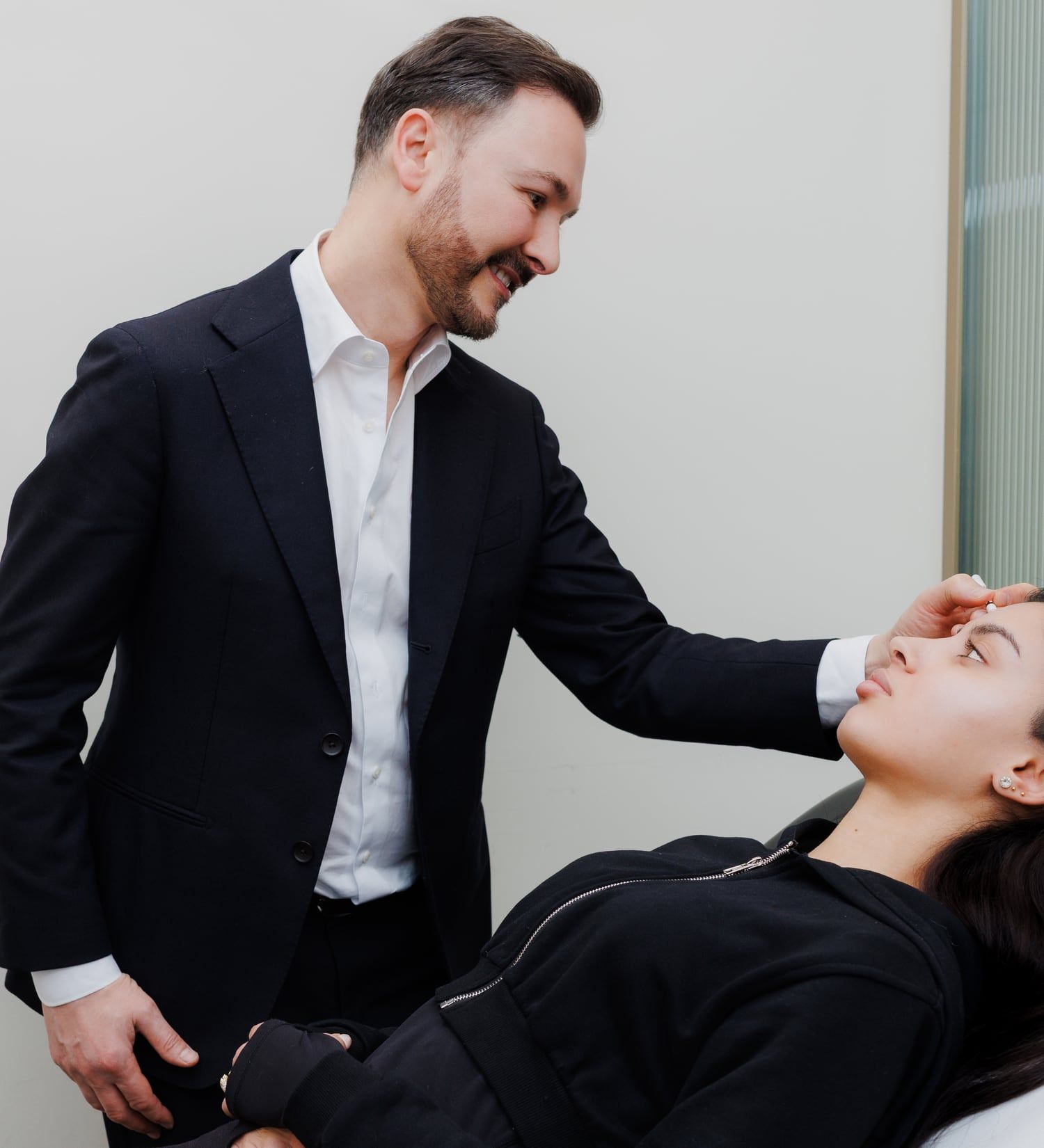 Dr Paul Elgey treating a patient at his Marylebone clinic