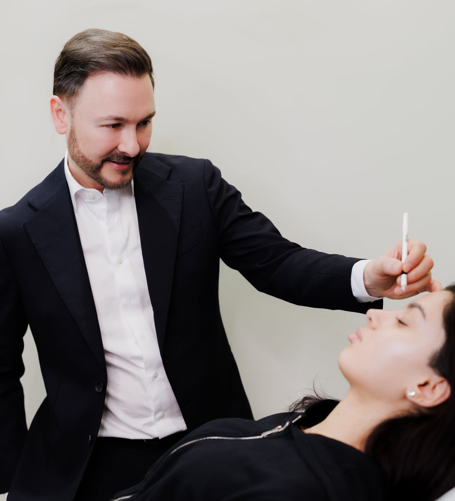 Dr Paul Elgey treating a patient at his Marylebone clinic
