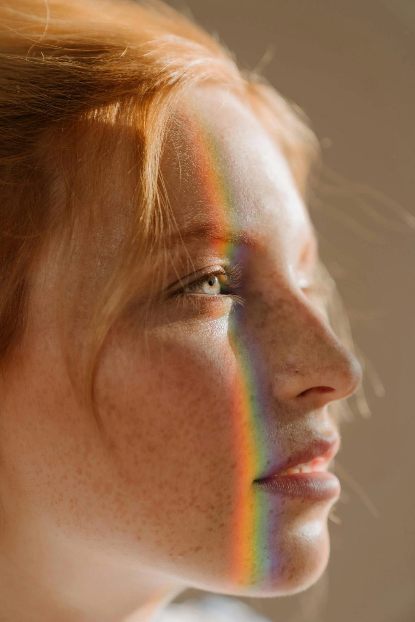 Side profile of a face in warm light