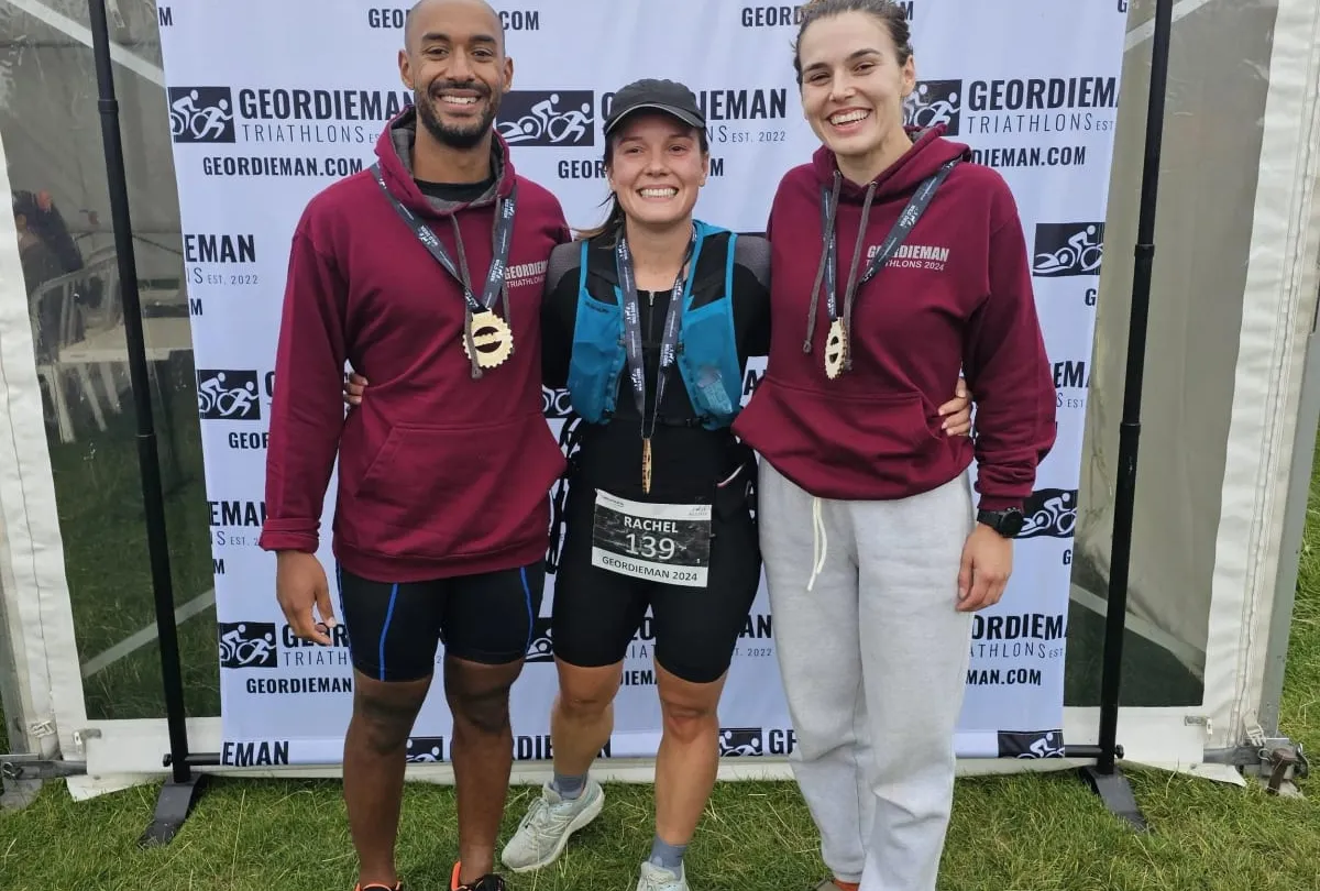 Three finishers with medals at the Geordieman triathlon