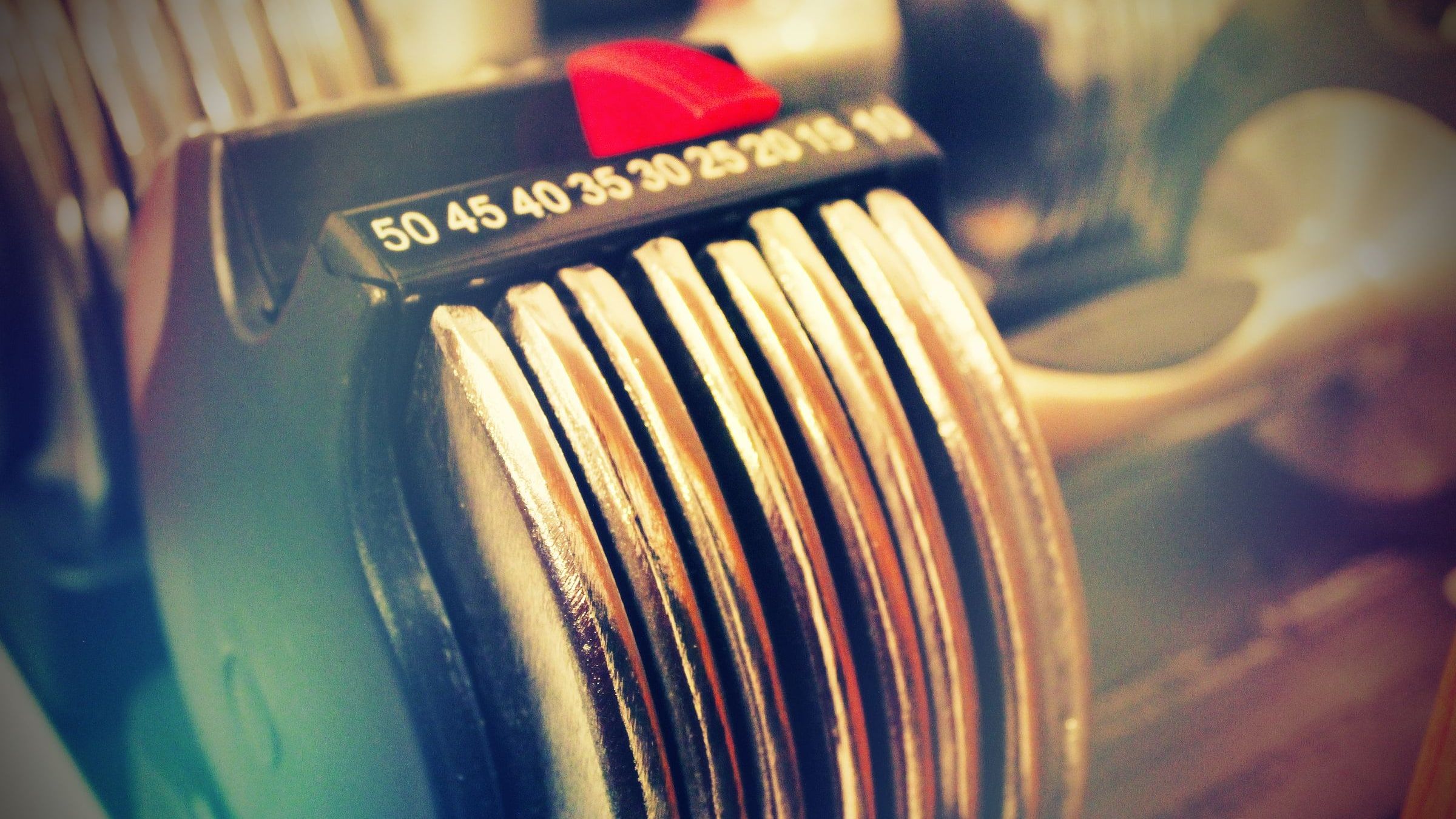 Close-up of an adjustable dumbbell weight dial