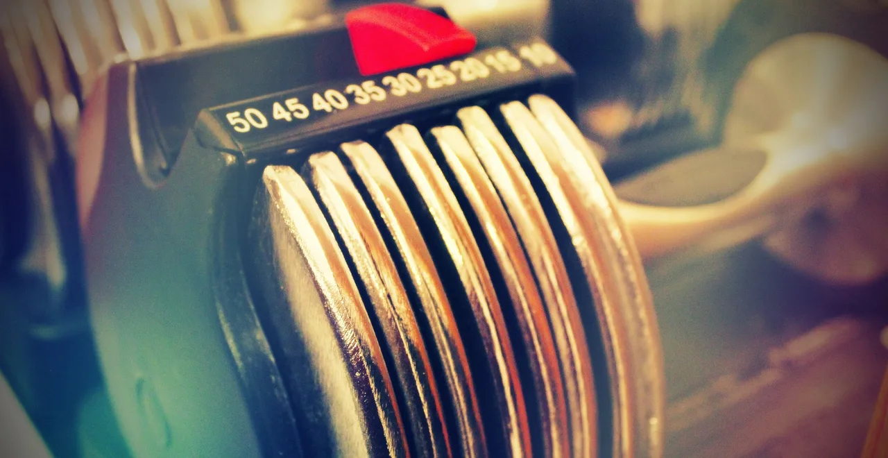 Close-up of an adjustable dumbbell weight dial