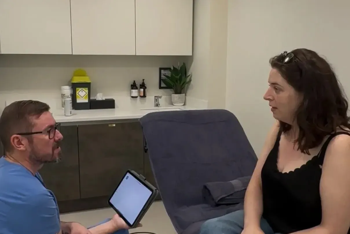 Aesthetic Nurse Practitioner carrying out a face-to-face consultation at Perfectus Derma Aesthetics, Soho