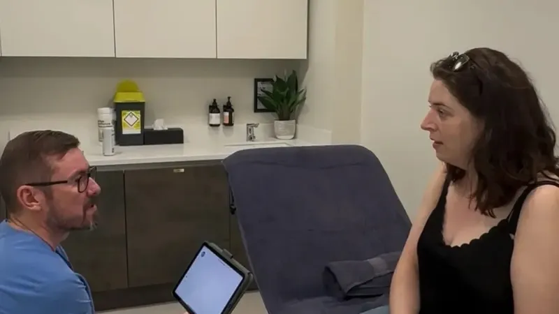 Aesthetic Nurse Practitioner carrying out a face-to-face consultation at Perfectus Derma Aesthetics, Soho