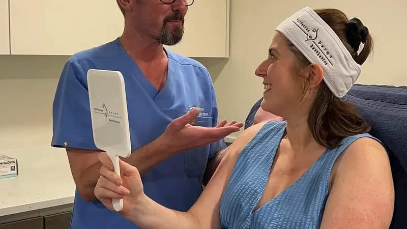 Aesthetic Nurse Practitioner discussing an exosome therapy treatment plan with a patient at Perfectus Derma Aesthetics, UNTIL Soho
