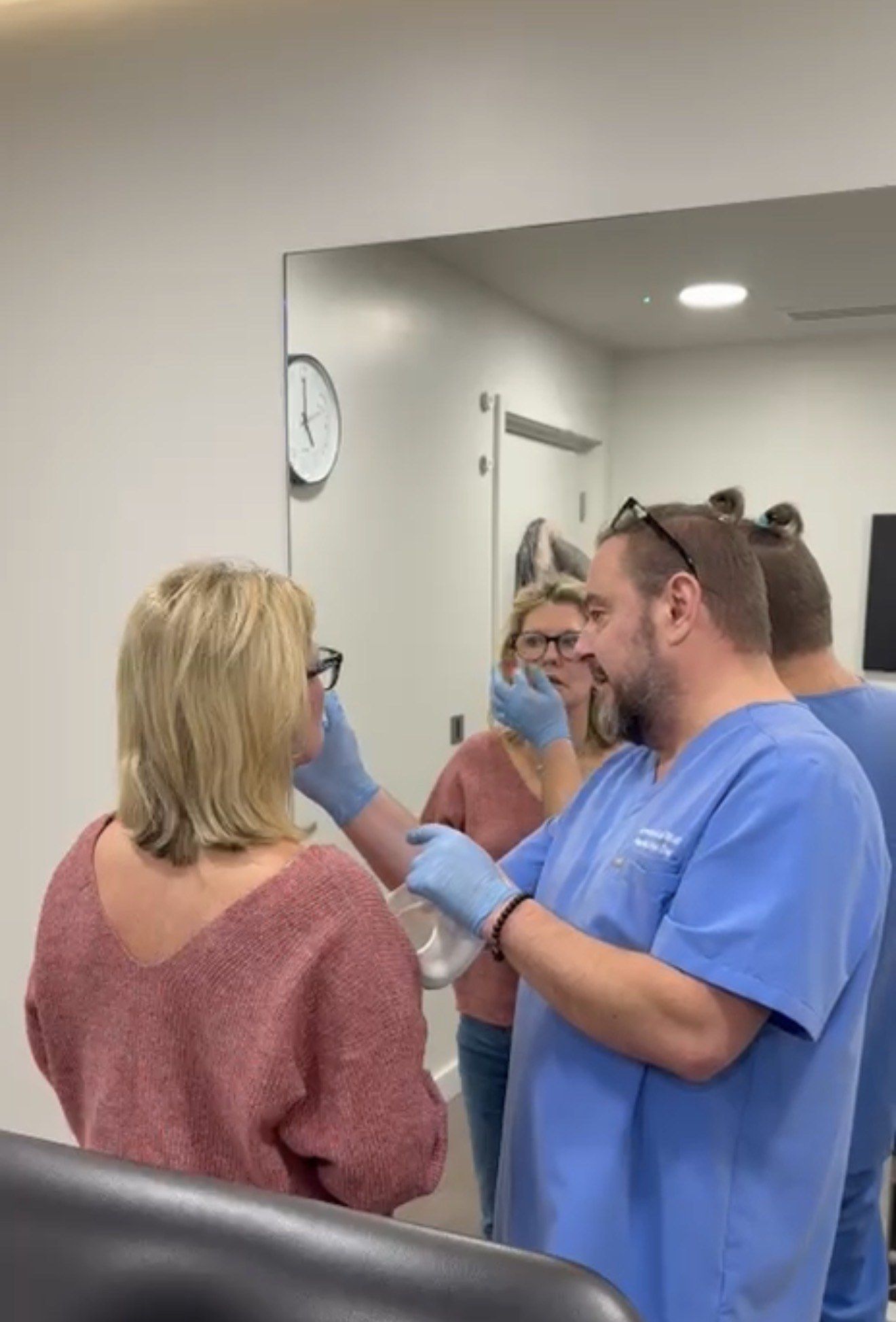 Aesthetic Nurse Practitioner carrying out a face-to-face skin assessment with a patient at Perfectus Derma Aesthetics, UNTIL Soho