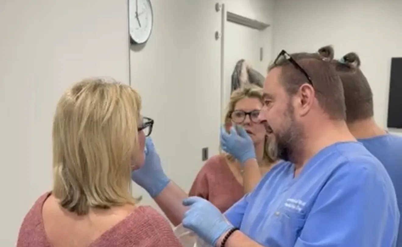 Aesthetic Nurse Practitioner carrying out a face-to-face skin assessment with a patient at Perfectus Derma Aesthetics, UNTIL Soho