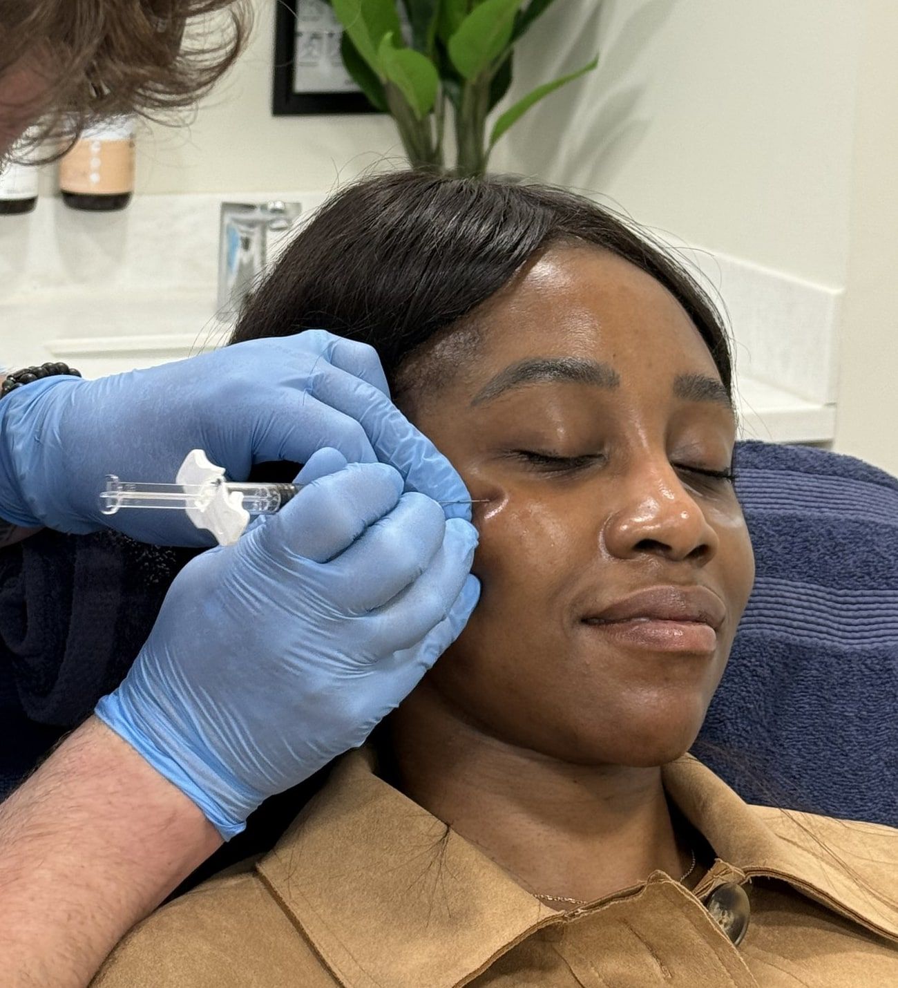 Aesthetic Nurse Practitioner administering an injectable skin booster treatment at Perfectus Derma Aesthetics, UNTIL Soho