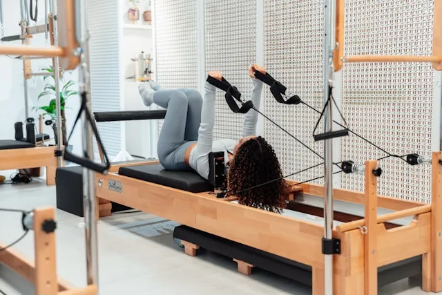 Rehabilitation-based Reformer Pilates session led by Ann Salmon at Physio and Performance in Soho, London