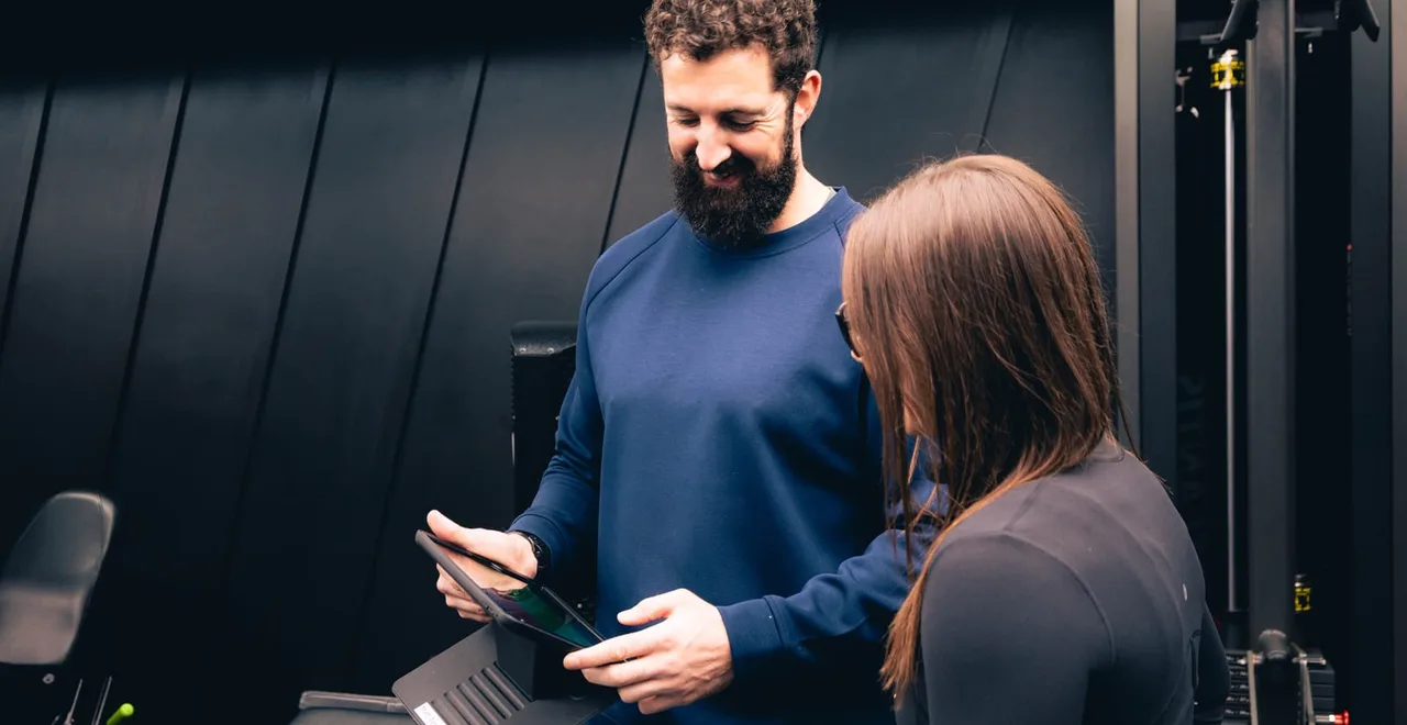 Matt Alexander going through assessment results with a client at UNTIL Liverpool Street